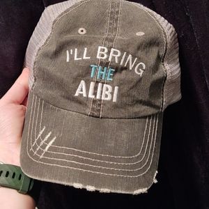 I'll Bring The Alibi Destroyed Trucker Hat